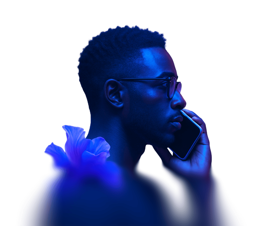 man with glasses on mobile phone