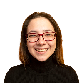 woman with long hair and glasses smiling